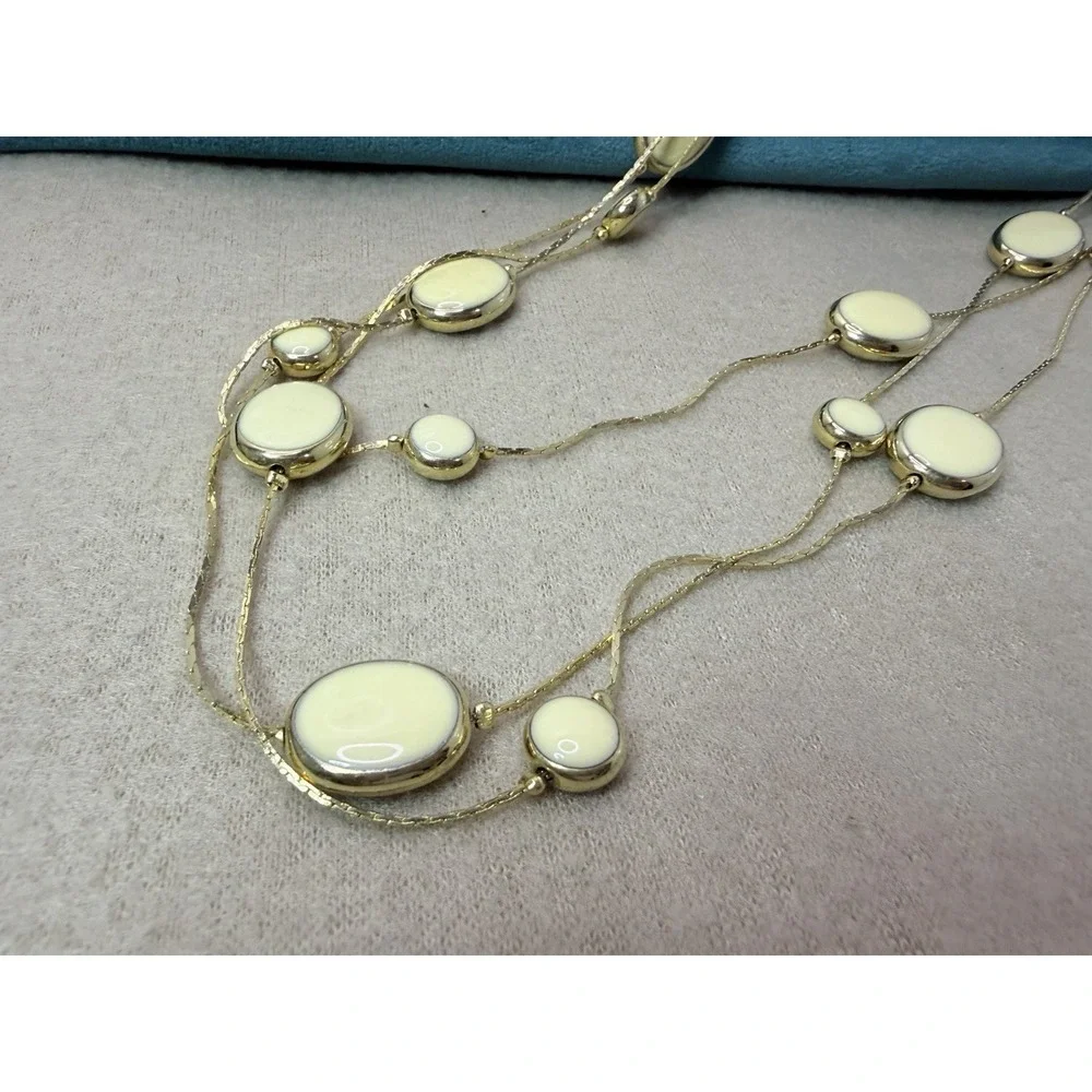 Vintage Avon 1980s Triple Strand Station Necklace Gold Tone Ivory Enamel 29 Inch
